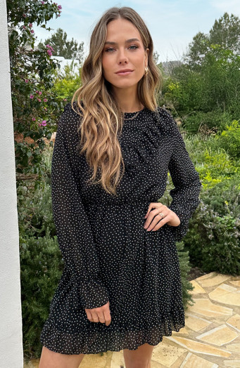 Schwarzes Kleid mit Rüschen und Polka-Dot-Muster